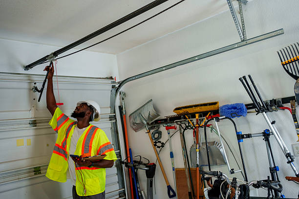 Professional Garage Door Panel Replacement technician working in Cando, ND
